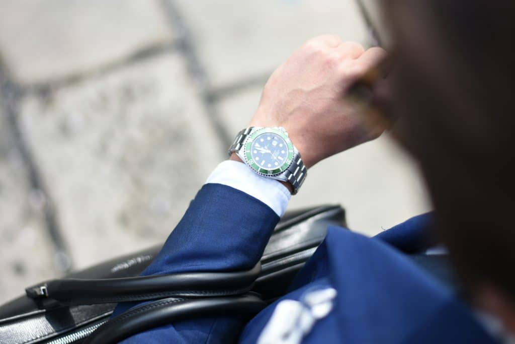person wearing luxury watch