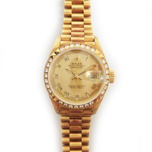 Rolex  Lady Datejust 26mm Diamond Bezel Yellow Gold 69268 CHAMPAGNE ROMAN PRESIDENT